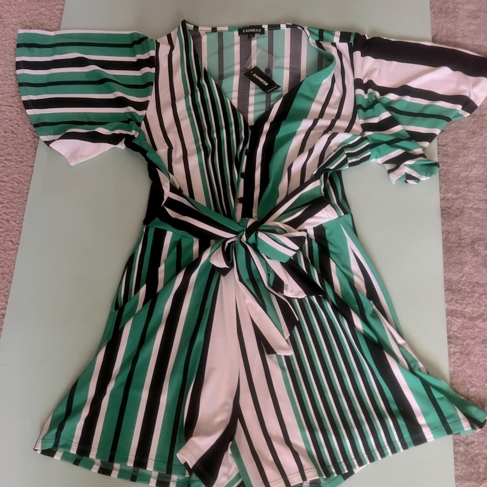 New. Express Romper. Size medium.